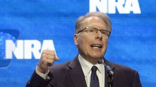 Embattled NRA chief announces his resignation