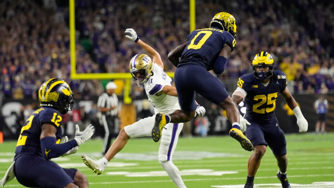 Undefeated Michigan Wolverines win the college football championship